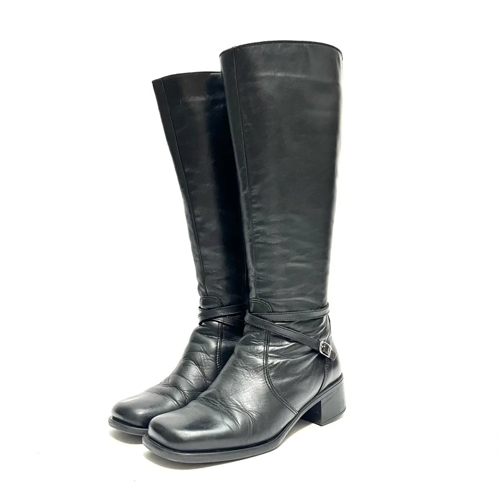 Vintage 1990s black leather knee high wool lined heeled winter fashion boots